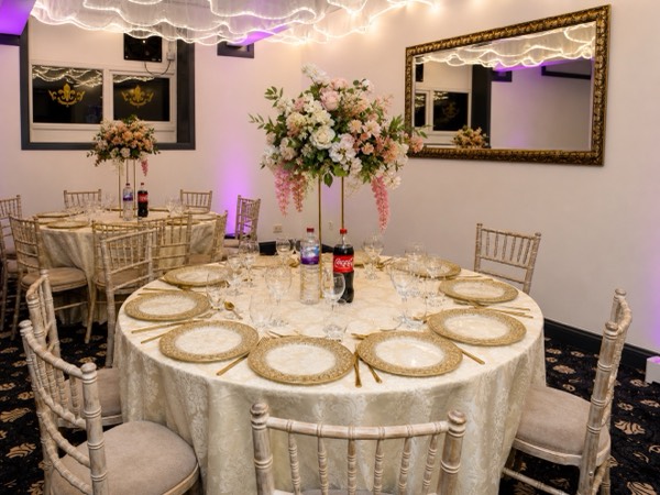 Elegant gold place settings at Green Lane Banqueting